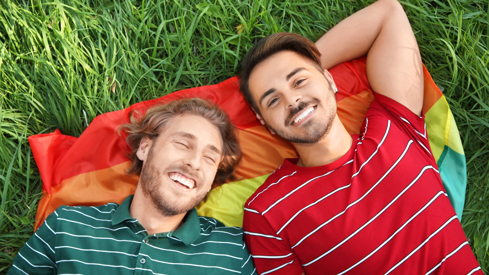 LGBTQ+ travelers and locals out together at night in the city